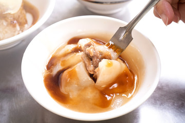 Bawan (Ba wan), taiwanese meatball delicacy, delicious street food, fried starch wrapped round shaped dumpling with pork inside, close up, copy space