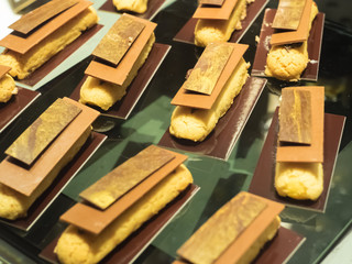 Dessert concept, sweet dessert in cafe, Cake on black wooden.