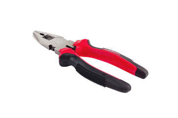 Obraz premium One new metal pliers with rubber handles black and red color isolated on white background. Repair or building concept