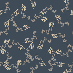 Urban camouflage of various shades of beige, grey and blue colors