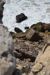 Rocky Cliff On The Beautiful Beach Of Cresmina In Cascais. Photograph of Street, Nature, architecture, history, Geology. April 15, 2014. Cascais, Lisbon, Portugal.