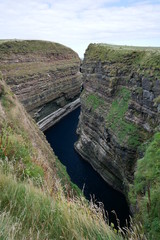 Fototapeta na wymiar The Geo of Sclaites, Duncansby Head, Caithness, Scotland, UK - near John o' Groats - Mey Flagstone Formation - Sandstone, Siltstone And Mudstone