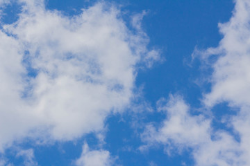 Blue sky white cumulus clouds background