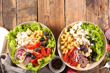 mixed vegetable salad with lettuce, feta, tomato and olive