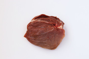 Pork flesh isolated on white background, top view