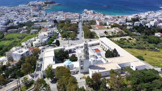 Aerial drone panoramic video of iconic church of Lady of Tinos island or Church of Panagia Megalochari (Virgin Mary), Cyclades, Greece