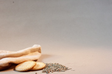 Crackers and tea leaves on the filter bags. Breakfast and tea time concept.