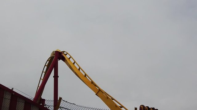 Slow Motion of people riding rollercoaster