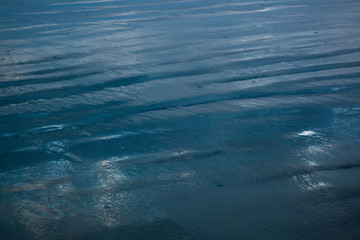 Reflections in the water at the beach