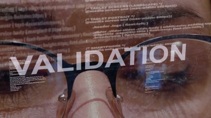 Validation text on the background of female software developer. Eyes of woman with glasses are looking at programming network code space abstract technologies connecting global data network