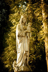 Ancient statue of Virgin Mary with Jesus Christ