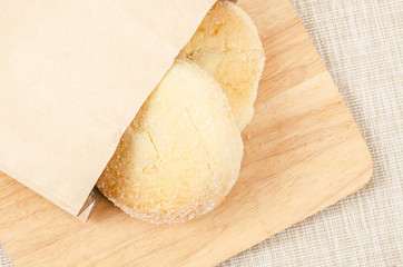 Bread and butter sweet in paper bag.