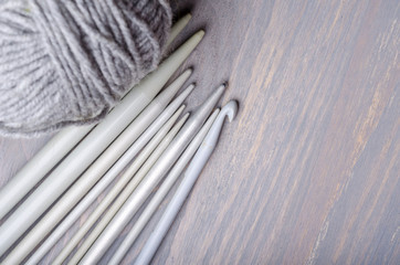 Knitting set on wooden table