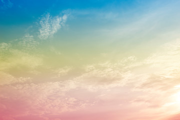 Fototapeta premium A soft fog cloud background with a pastel colored orange to blue gradient