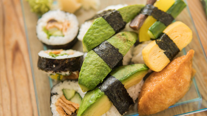 Asian food, sushi rolls on a table