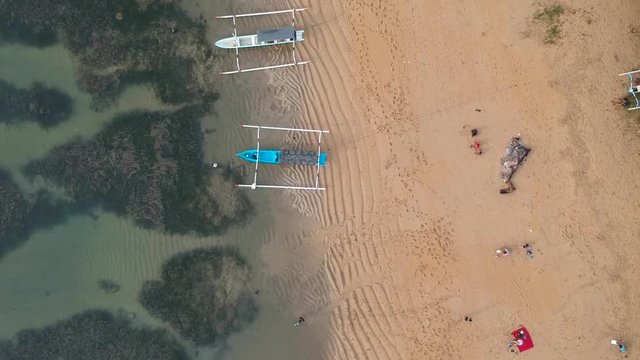 Aerial view from Karang Beach Sanur Bali with beautiful white sand and traditional Balinese boats