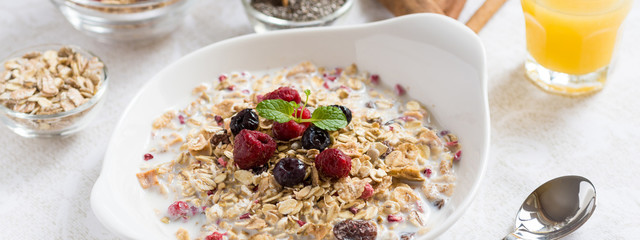 Healthy Breakfast Muesli With Milk, Chia Seeds, Berries and Cinnamon. Sunny Morning.