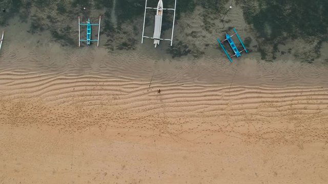 Aerial view from Karang Beach Sanur Bali with beautiful white sand and traditional Balinese boats