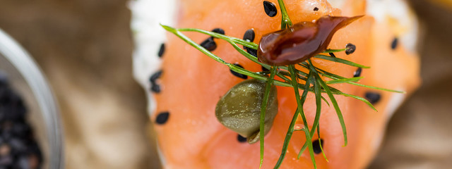 Smoked Salmon Canape with Cream Cheese, Fresh Dill and Black Sesame. Finger Food.