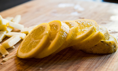 Lemon slices on a wooden table