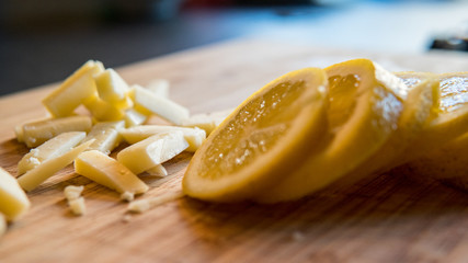 Lemon slices on a wooden table