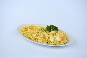 Cabbage salad in a plate.