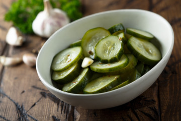 Homemade pickled cucumbers with garlic