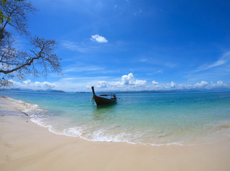 Obraz premium Seascape wtih boat in summer and nice beach top view by extreme camera