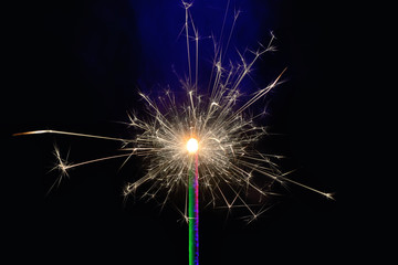 Obraz premium Burning sparkler isolated
