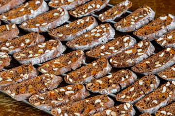 Freshly baked chocolate biscotti with nuts and dried fruits close-up
