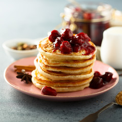 Homemade pancakes with spicy cherry sauce