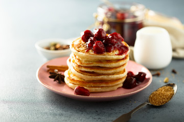 Homemade pancakes with spicy cherry sauce