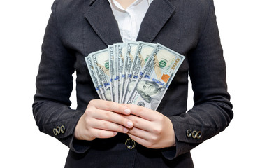 Female hands hold dollars on a white background.