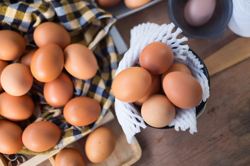 Fresh eggs in basket on table prepare eggs for cooking