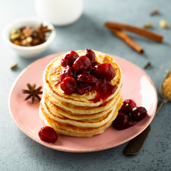 Homemade pancakes with spicy cherry sauce