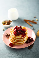 Homemade pancakes with spicy cherry sauce