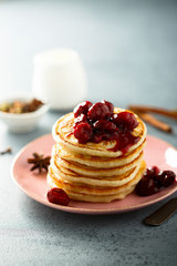 Homemade pancakes with spicy cherry sauce