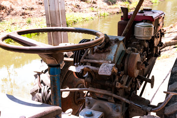 Close up machine for lowing field, tractor