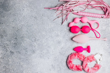 Different sex toys set on a light background.