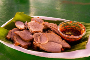 Grilled pork neck with dipping sauce