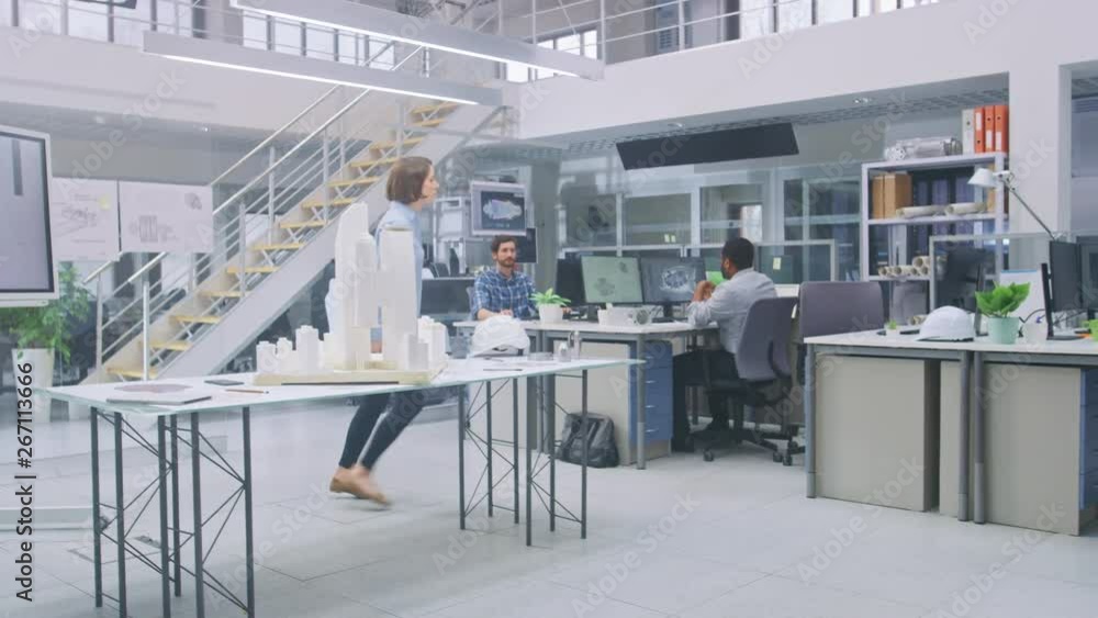 Poster in architectural bureau: team of architects and engineers working on a building complex prototype pr