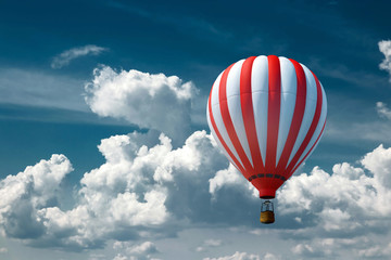 Naklejka premium Multicolored, large balloons against the blue sky. Travel concept, dream, new emotions, travel agency.