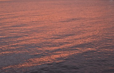 Sea surface in sunset light