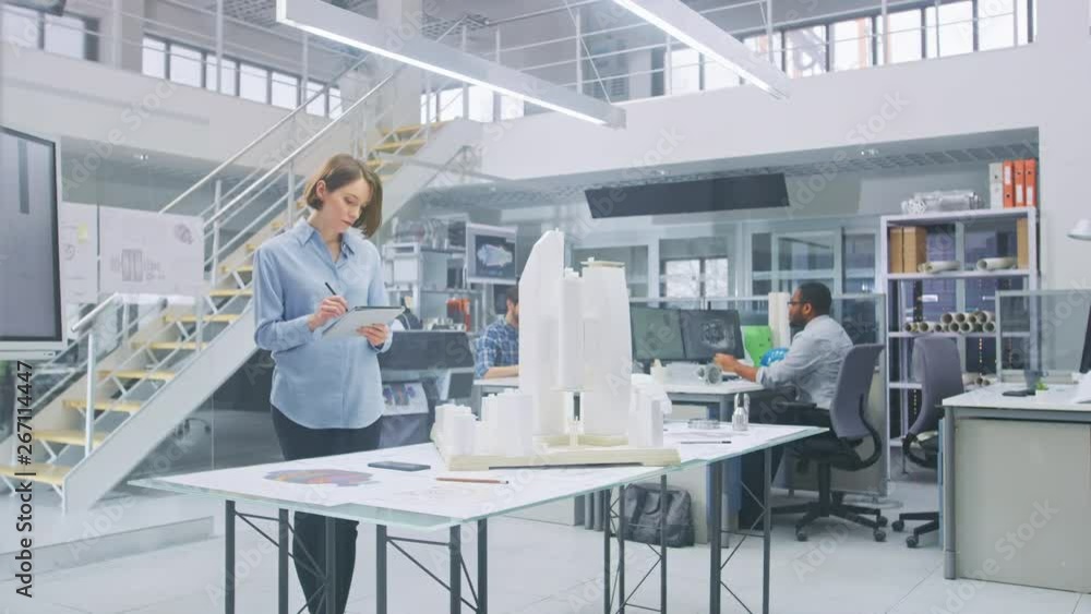Poster in architectural agency: team of architects and engineers working on a building complex prototype pr