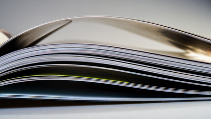 pages of an open book lying on the table.