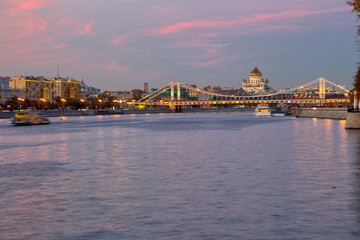 Moskva River and Krymsky or Crimean Bridge (at night)-- is a steel suspension bridge in Moscow, Russia. The bridge spans the Moskva River 1800 metres south-west from the Kremlin