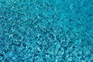 water surface with reflection above the pool