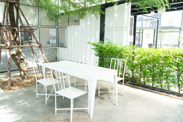 white table with container wall