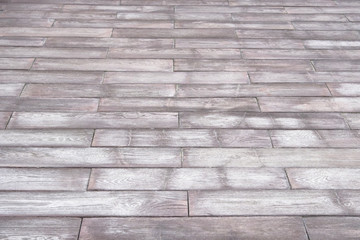 Wood floor perspective. Gray wood background. Grunge texture. Front view. Mock up.