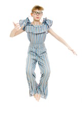 Young teenaged girls wearing jumpsuit dress with gaps texture - jumping high.